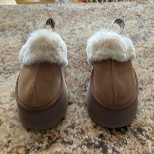 New size 7 high wedge Uggs slippers